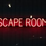 red escape rooms neon sign